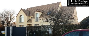 Maison Ova combles contemporains fenetre cintre modenature plancher beton dans les yvelines archidesign